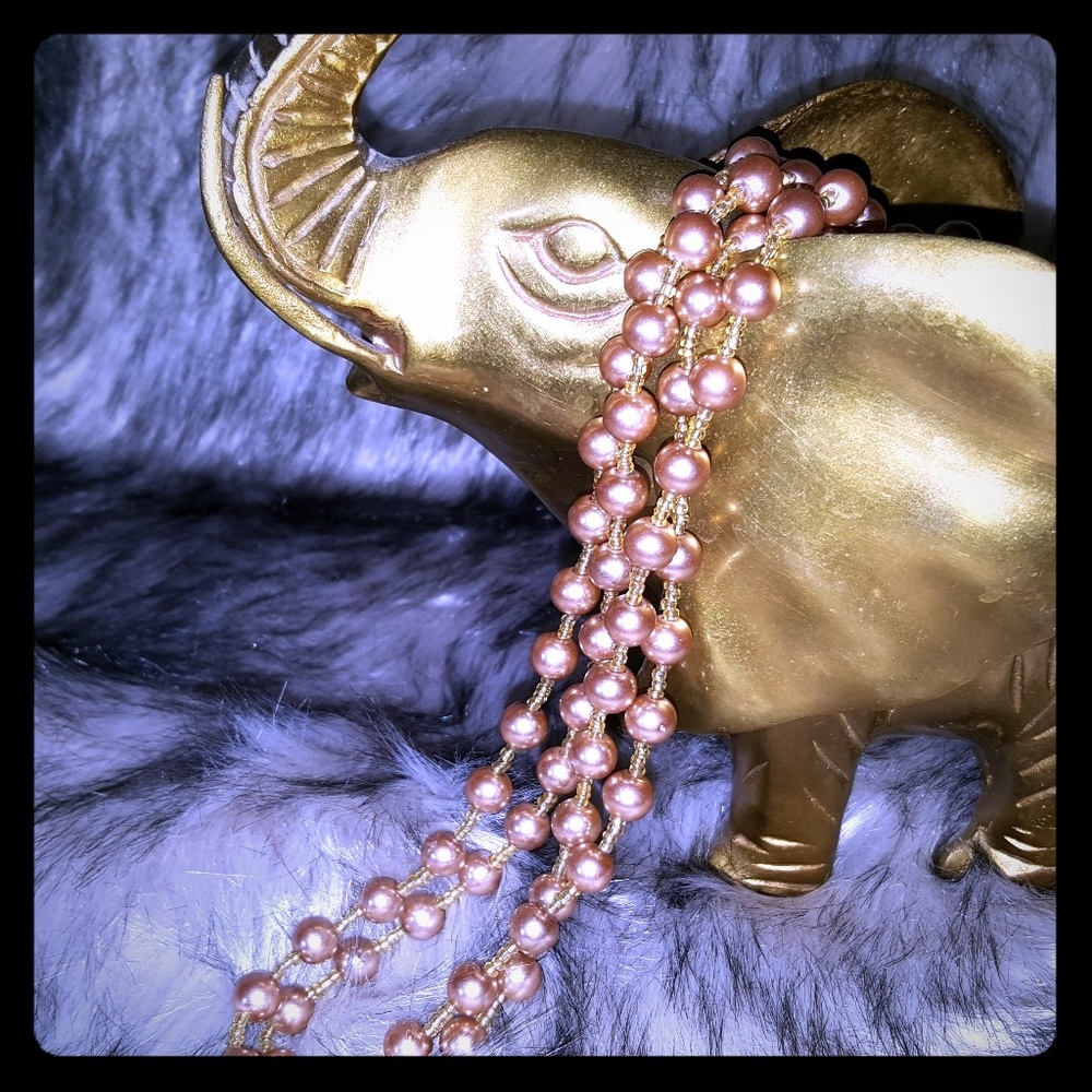 Long faux pearl necklace
